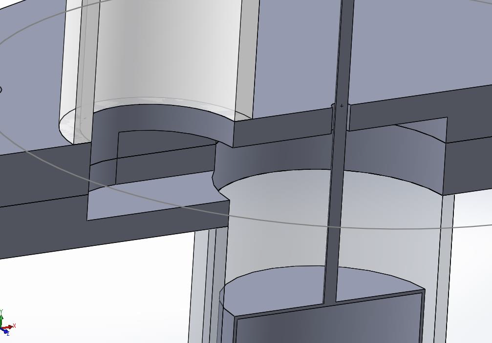 passage-way between displacement and power cylinders